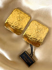 Maxi clip oro con logo “Yves Saint Laurent”