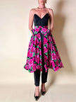 Gonna a ruota in seta fantasia floreale fucsia con maxi fiocco