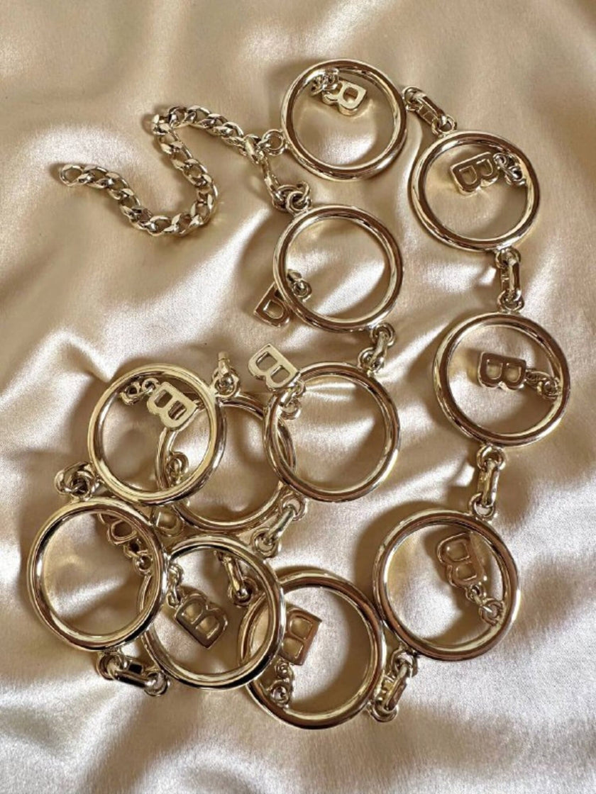 Cintura dorata a catena con charm a forma di B “Blumarine”