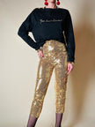 Maglia in cotone nero con bottoni dorati “Yves Saint Laurent”