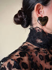 Maxi clip dorate a forma di cuore “Moschino”