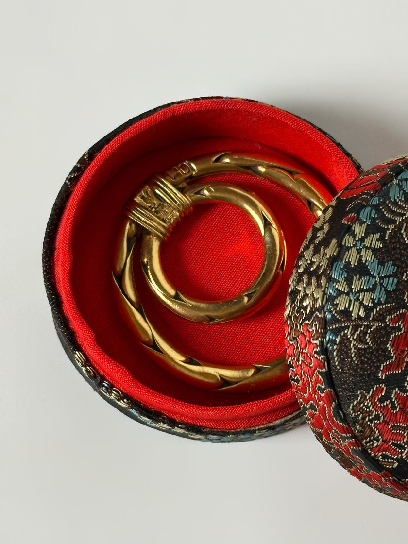 Ferma foulard vintage Yves Saint Laurent in metallo dorato a doppio anello intrecciato