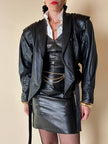 Biker vintage in pelle nera con cintura in vita e fodera couture