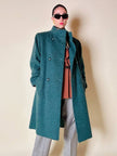 Cappotto doppiopetto in lana bouclé verde bosco con fodera firmata