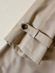 Trench color sabbia con fodera tartan “Idrostop”
