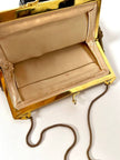 Borsa vintage Art Déco in lamé oro intrecciato con chiusura gioiello e nappa couture
