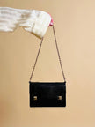 Borsa in pelle nera in stampa tejus 