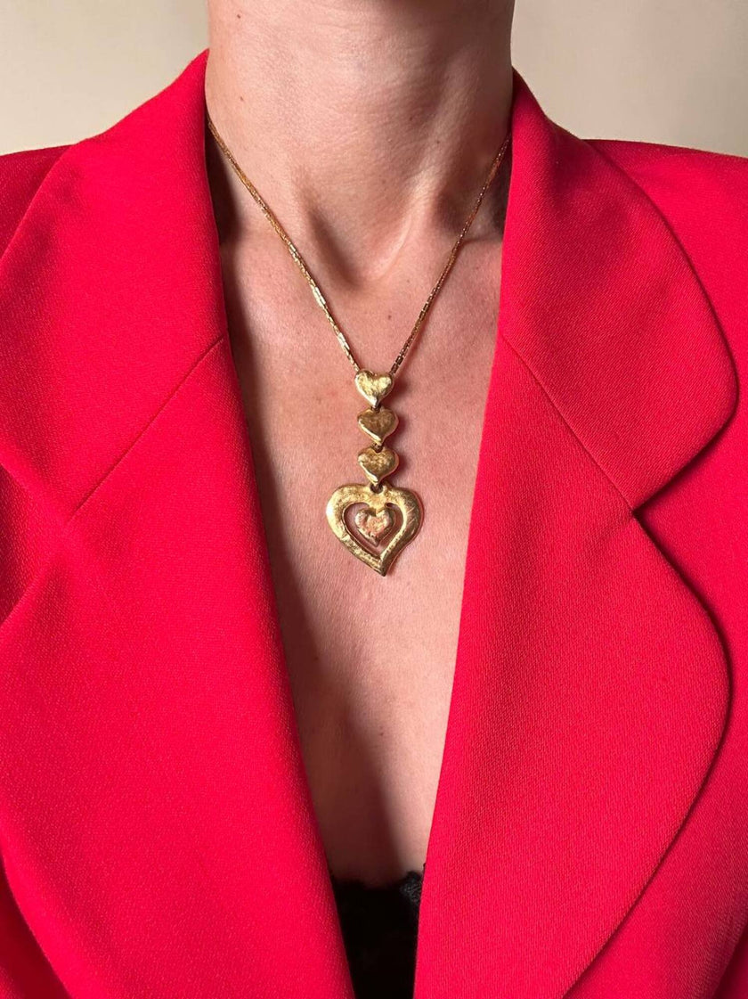 Collana dorata con ciondolo pendente a cuoricini “Yves Saint Laurent”