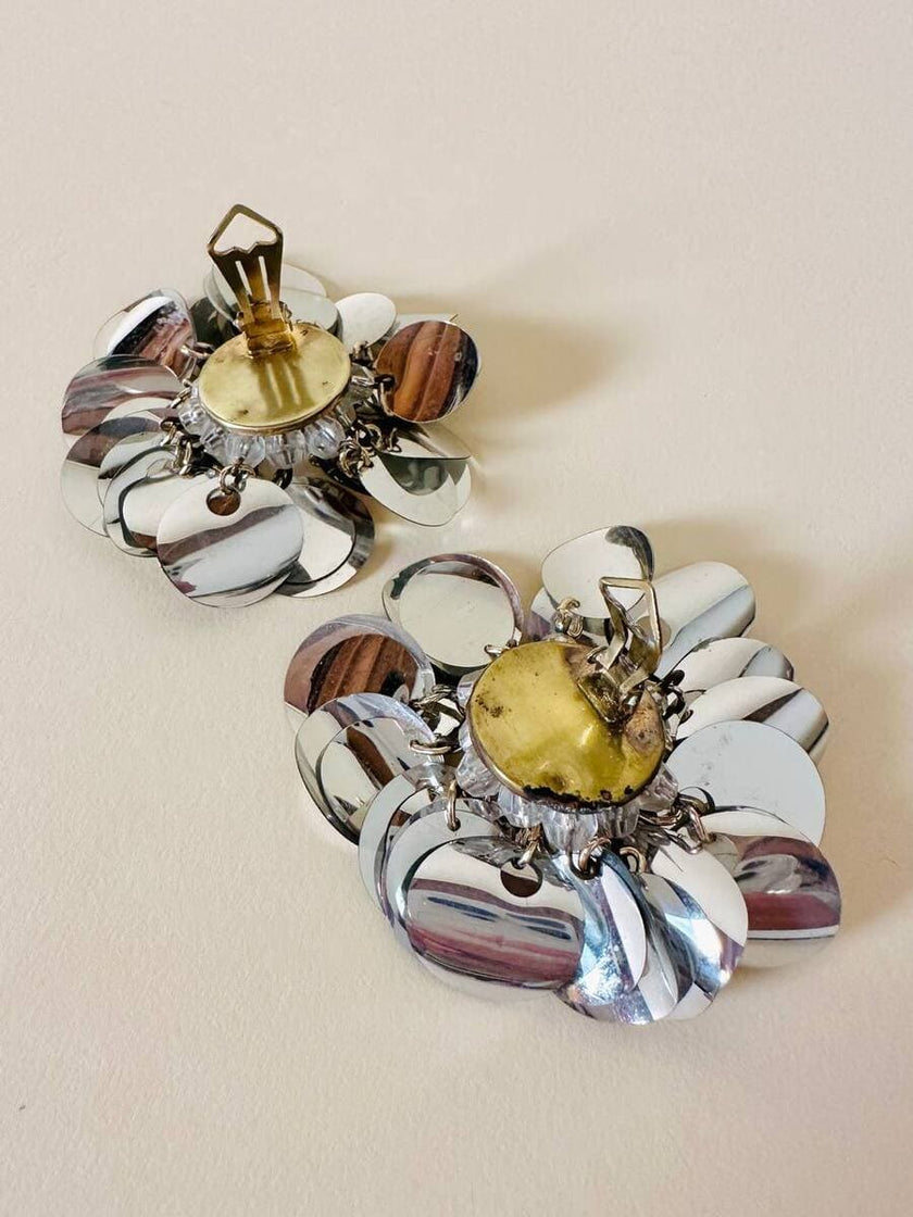 Parure composta da clip e mini bag in paillettes argento