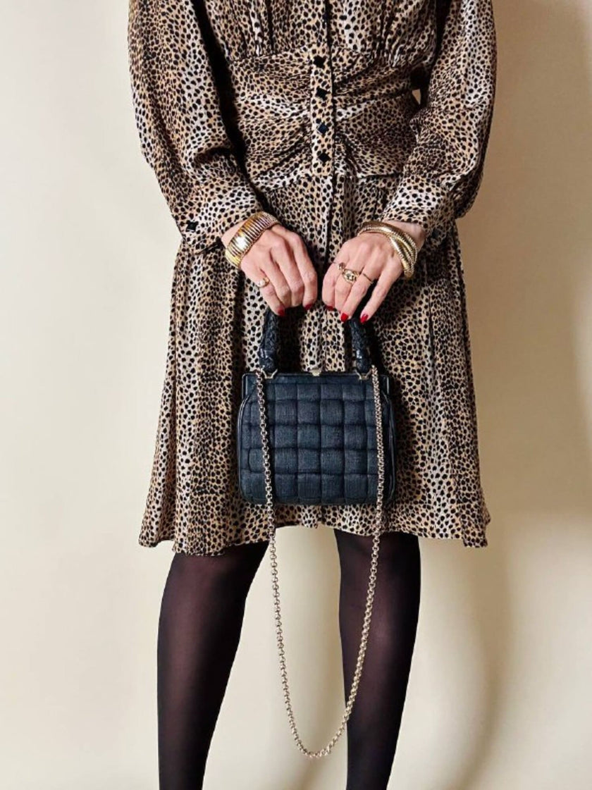 Mini bag in tessuto intrecciato con riporti in pelle