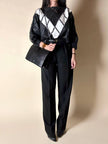 Blusa vintage in pelle nera e bianca patchwork con lavorazione crochet e maniche a pipistrello