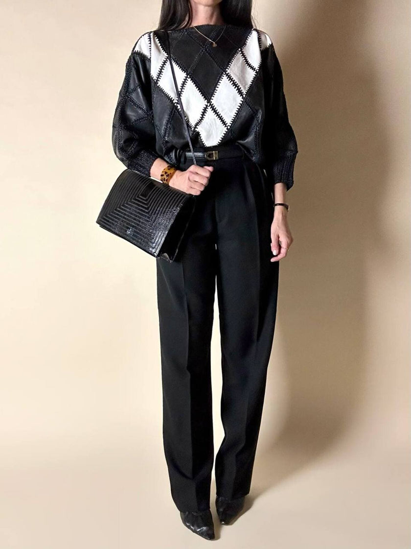 Blusa vintage in pelle nera e bianca patchwork con lavorazione crochet e maniche a pipistrello