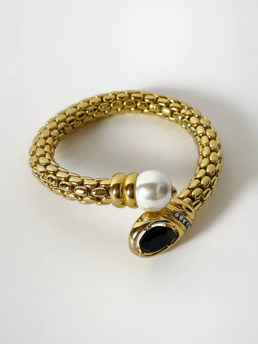 Bracciale vintage in metallo dorato con perla onice nero e cristalli