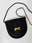 Borsa vintage Nina Ricci Paris in passamaneria nera con fiocco dorato