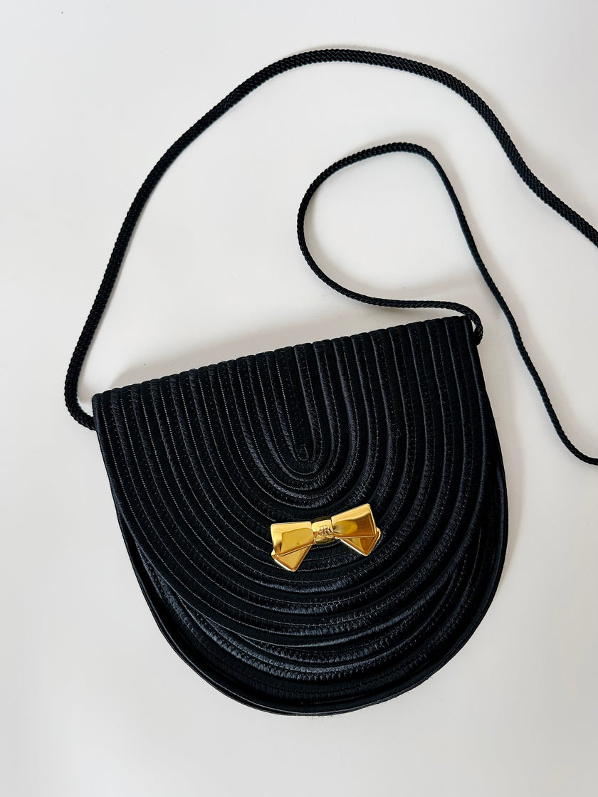 Borsa vintage Nina Ricci Paris in passamaneria nera con fiocco dorato
