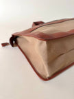 Borsa Yves Saint Laurent in canvas beige con profili color cuoio e motivo greca con logo
