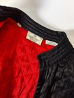 Bomber vintage Valentino Boutique in raso di seta nera trapuntato con fodera rossa