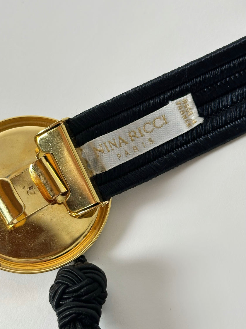 Cintura vintage Nina Ricci Paris in passamaneria elastica nera con fibbia gioiello e nappa couture