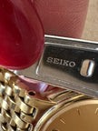 Orologio dorato con cinturino a bracciale “Seiko”