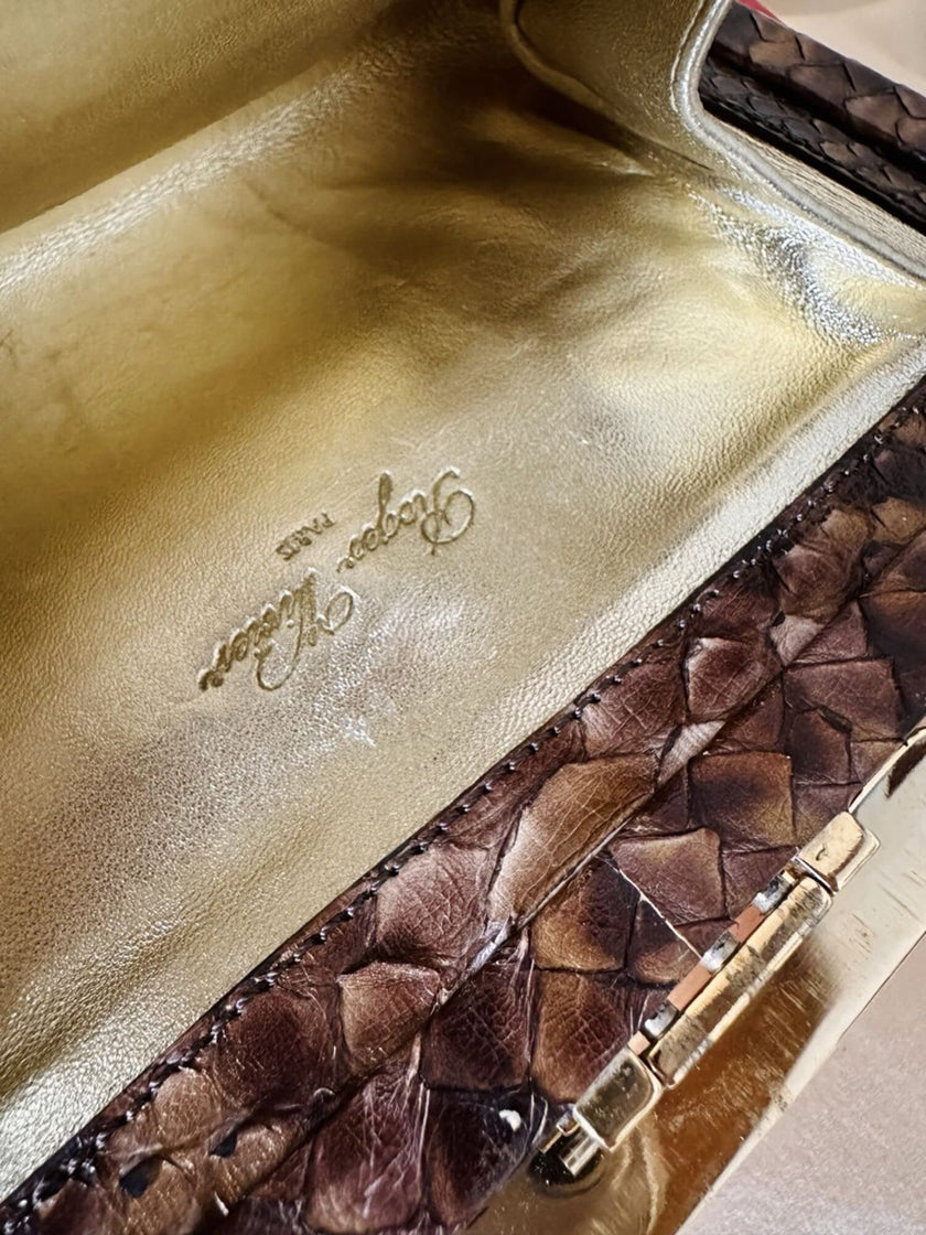 Vintage Roger Vivier leopard-print python clutch with a distinctive rectangular gold-tone metal clasp