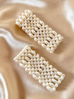 Polsiere elasticizzate di perle sintetiche bianche