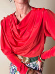 Blusa rossa con scollo drappeggiato “Yves Saint Laurent”