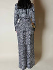 Jumpsuit in seta fantasia zebrata con maxi fiocco al collo