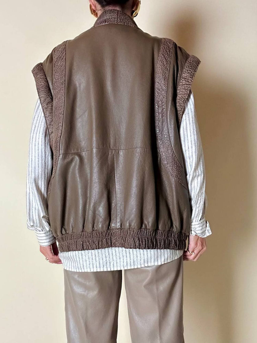 Bomber con maniche rimovibili in pelle color fango “Arpell”