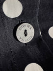Completo oversize nero a pois bianchi in Cupro “Divina”