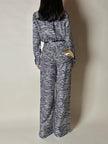 Jumpsuit in seta fantasia zebrata con maxi fiocco al collo