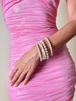Set di cinque bracciali con perle sintetiche bianche