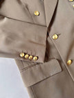 Blazer vintage Yves Saint Laurent in lana cachi doppiopetto con bottoni logati oro