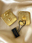 Maxi clip oro con logo “Yves Saint Laurent”