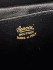 Mini pochette in tessuto nero con chiusura logata color oro “Gucci”