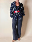 Completo oversize nero a pois bianchi in Cupro “Divina”