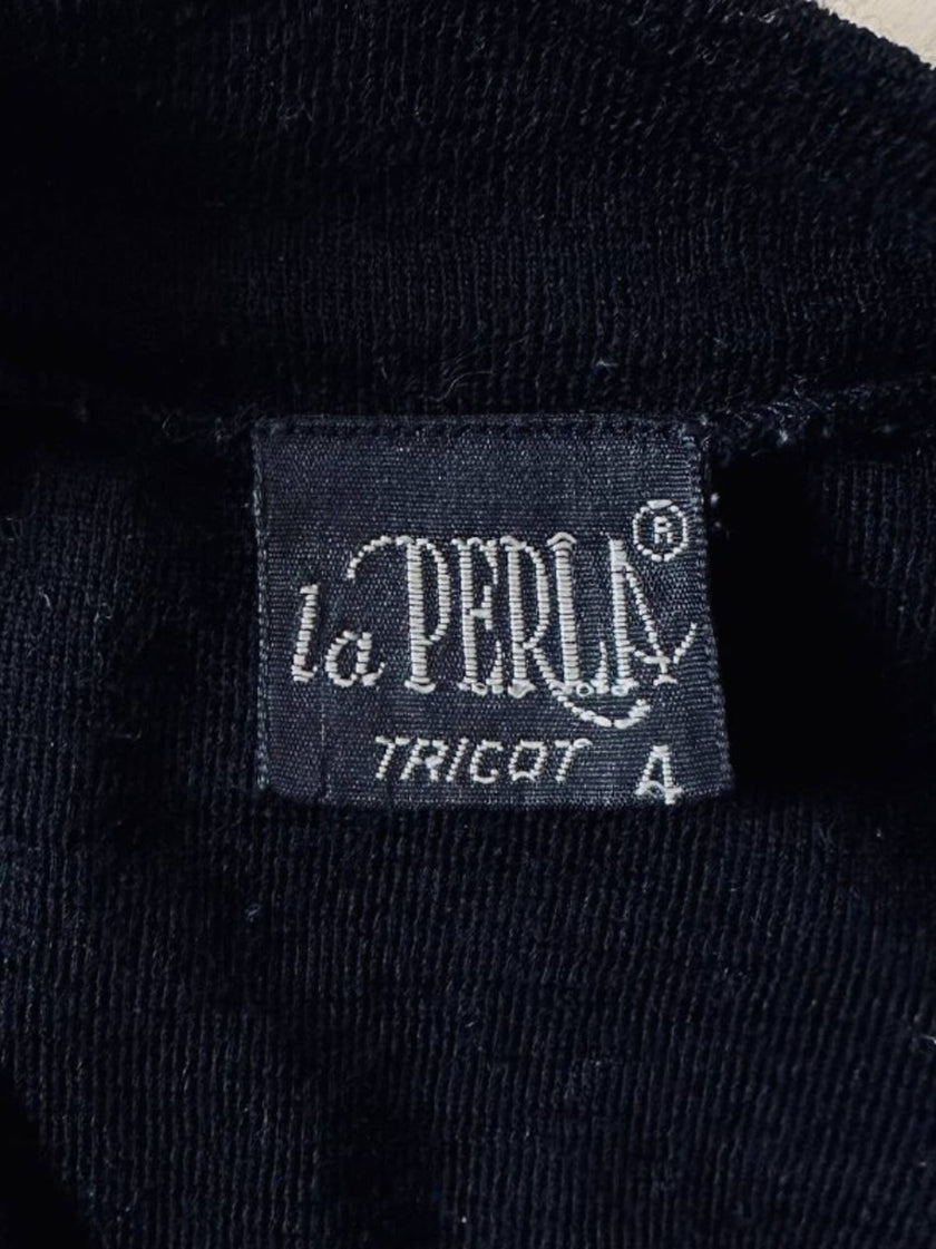 Body vintage La Perla in tulle nero e lana con applicazioni floreali in raso