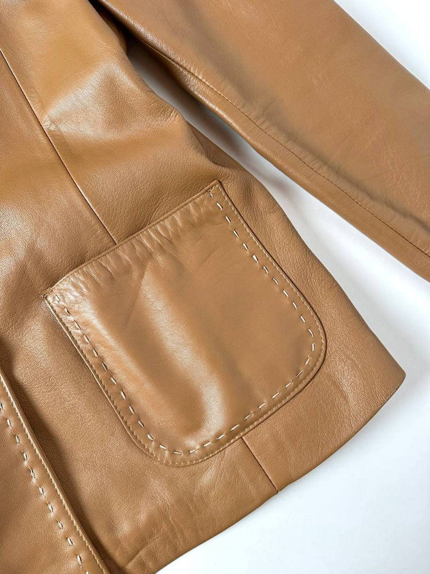 Vintage tan leather jacket with hand-stitched detailing by Claude Collections