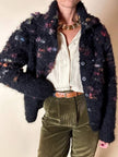 Cardigan in lana bouclé nera con lavorazione bottonata multicolor