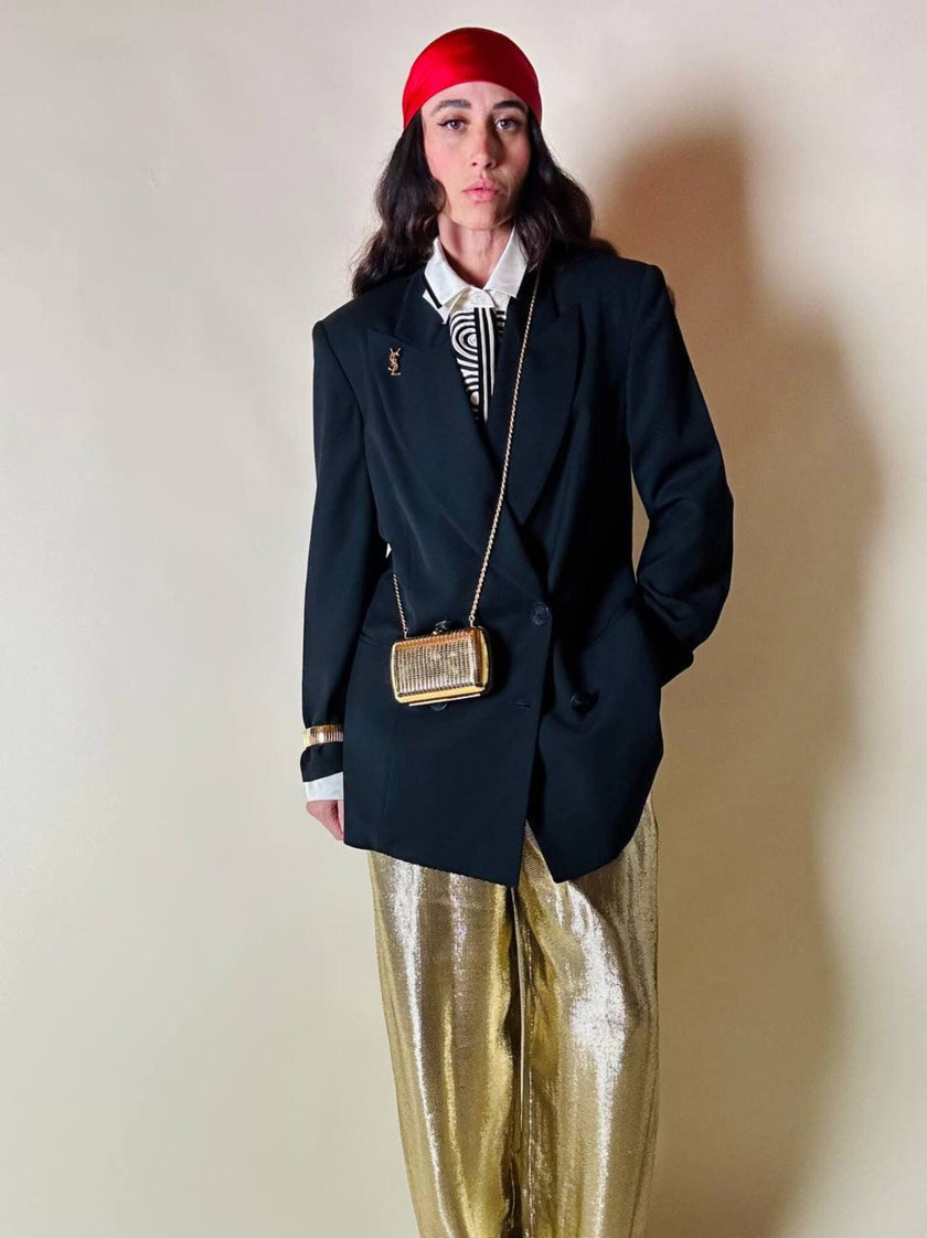 Mini clutch in metallo oro con tracolla in catena