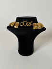 Collier vintage oro con elementi geometrici striati