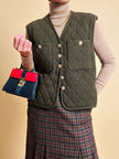 Gilet in lana matelassé verde militare con bottoni dorati 