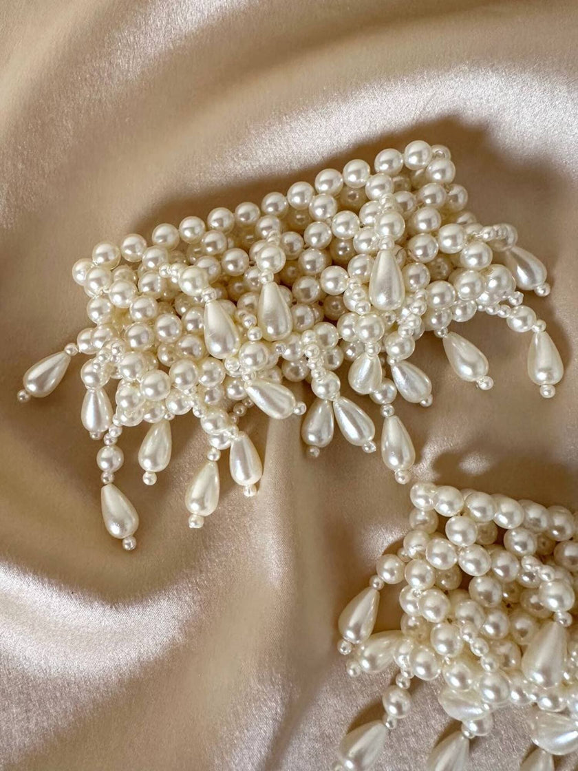 Polsiere elasticizzate di perle sintetiche