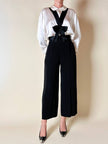 Pantalone nero con bretelle e maxi fiocchi in raso “Moschino Cheap and Chic”