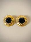 Clip oro con cabochon nero