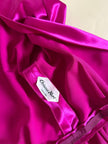 Wrap dress in raso ciclamino con cintura in coordinato “Sartoria Oriana Neri”