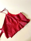 Wrap top in pelle rossa “Marina Babini”