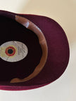 Coppola in feltro di lana bordeaux con rifinitura in pelle cuoio Fellini Roma