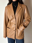 Vintage tan leather jacket with hand-stitched detailing by Claude Collections