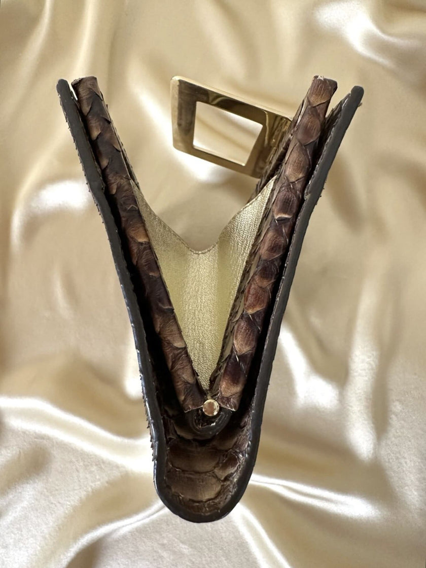 Vintage Roger Vivier leopard-print python clutch with a distinctive rectangular gold-tone metal clasp