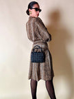 Mini bag in tessuto intrecciato con riporti in pelle